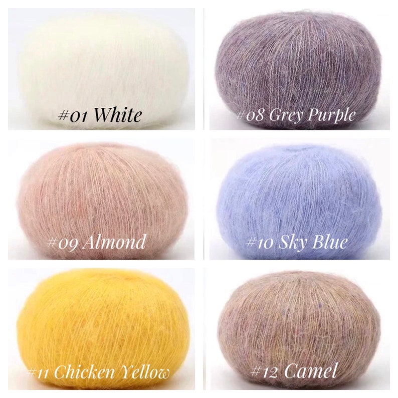 Peut inclure: Six pelotes de laine de diff&eacute;rentes couleurs&nbsp;: blanc, gris-violet, amande, bleu ciel, jaune poulet et camel. Chaque pelote est &eacute;tiquet&eacute;e avec un num&eacute;ro et un nom de couleur.