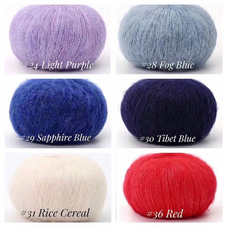 Peut inclure: Six pelotes de laine de diff&eacute;rentes couleurs&nbsp;: violet clair, bleu clair, bleu, bleu fonc&eacute;, blanc et rouge. Chaque pelote porte une &eacute;tiquette avec un num&eacute;ro et le nom de la couleur.