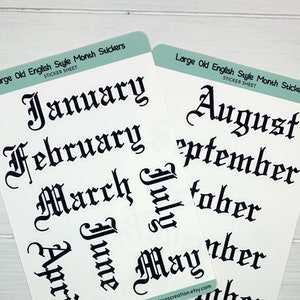 May include: Two sheets of stickers with large, black, old English style lettering of the months of the year. The first sheet includes January, February, March, April, June, and May. The second sheet includes August, September, October, November, and December. The sheets are white with a light blue border and the text "Large Old English Style Month Stickers" and "Sticker Sheet" at the top.