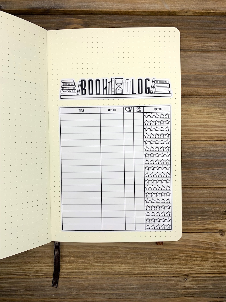 May include: A book log with a black and white illustration of a bookshelf with books and an hourglass. The log has columns for title, author, start date, end date, and rating. The rating column has a row of five stars for each book.