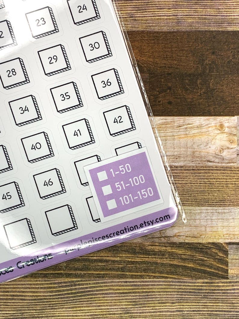 May include: A sheet of white stickers with black outlines and numbers from 1 to 50. The stickers are arranged in a grid pattern. There is a separate sticker with three boxes, each with a number range: 1-50, 51-100, and 101-150. The text "purplepiscescreation.etsy.com" is printed on the bottom of the sticker sheet.