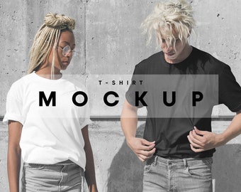 May include: Two people wearing t-shirts. One person is wearing a white t-shirt and the other is wearing a black t-shirt. The text "T-SHIRT MOCKUP" is superimposed on the image.