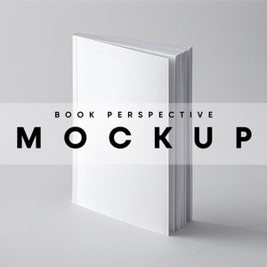 Puede incluir: Una maqueta de libro blanco con el texto "BOOK PERSPECTIVE MOCKUP" sobre un fondo blanco.