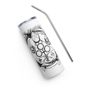 May include: White insulated tumbler with a black and white graphic design and a silver metal straw. The design features geometric shapes, symbols, and text. The tumbler is cylindrical and has a silver lid.