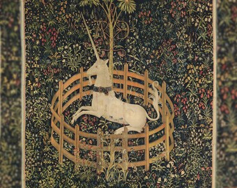 May include: A white unicorn with a golden horn is trapped in a circular wooden fence. The unicorn is surrounded by a lush green meadow with a variety of flowers and plants.