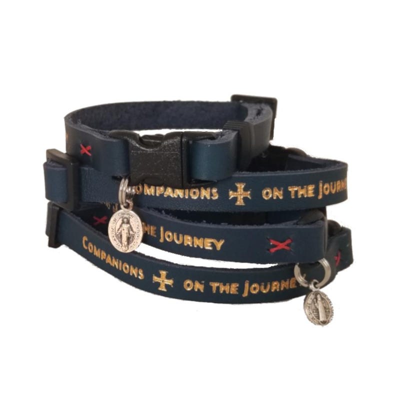 Navy blue leather cat collar. adjustable. Gold foil leather stamp lettering. Companions on the journey. Holy medals options: miraculous medal or St Benedict medal.