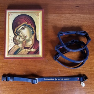 leather collar with holy medal