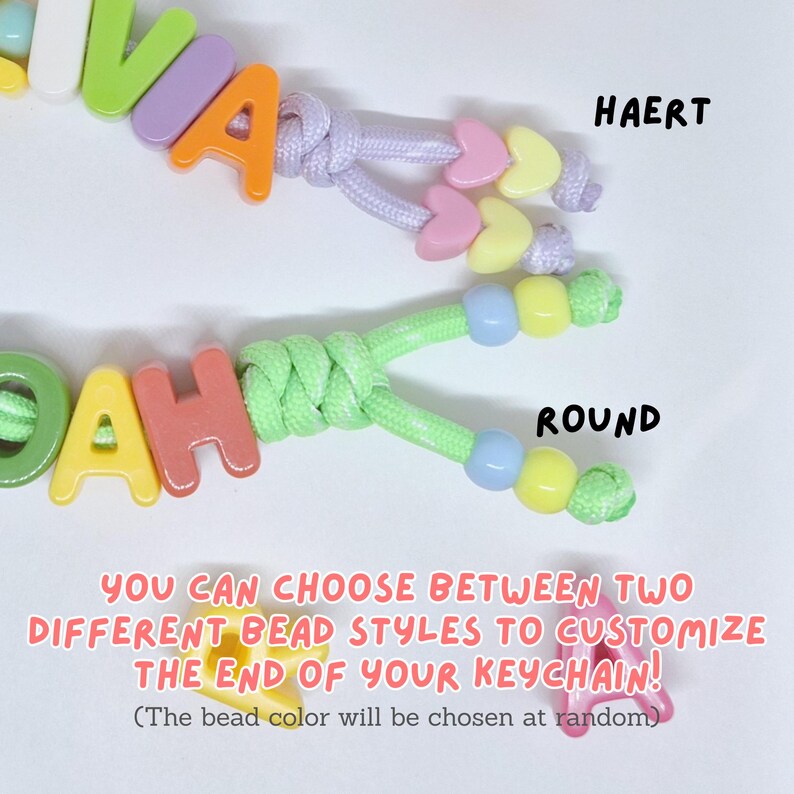 May include: Two personalized keychains featuring colorful plastic letter beads spelling names. One keychain has heart-shaped beads at the ends labeled HAERT, and the other has round beads labeled ROUND. Text states: YOU CAN CHOOSE BETWEEN TWO DIFFERENT BEAD STYLES TO CUSTOMIZE THE END OF YOUR KEYCHAIN! (The bead color will be chosen at random).