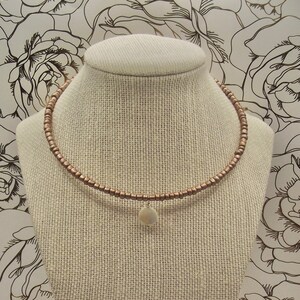 Gold glass seed beads, memory wire Choker, with white mother of pearl color pendent