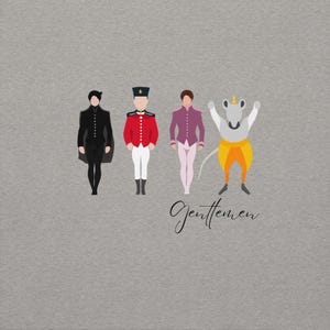 May include: A gray t-shirt featuring four stylized figures. The figures are dressed in various outfits, including a black coat, a red military jacket, a purple jacket, and a mouse wearing a crown. The word "Gentlemen" is written in cursive below.
