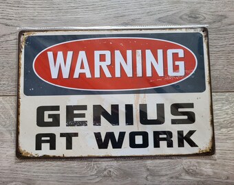 Genius At Work Sign 30cm x 20cm Retro Vintage Wall Art Garage Office Sign