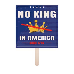 May include: A rectangular sign on a wooden stick with the words "NO KING IN AMERICA SINCE 1776". The sign has a blue background with a gold crown crossed out by a red line.