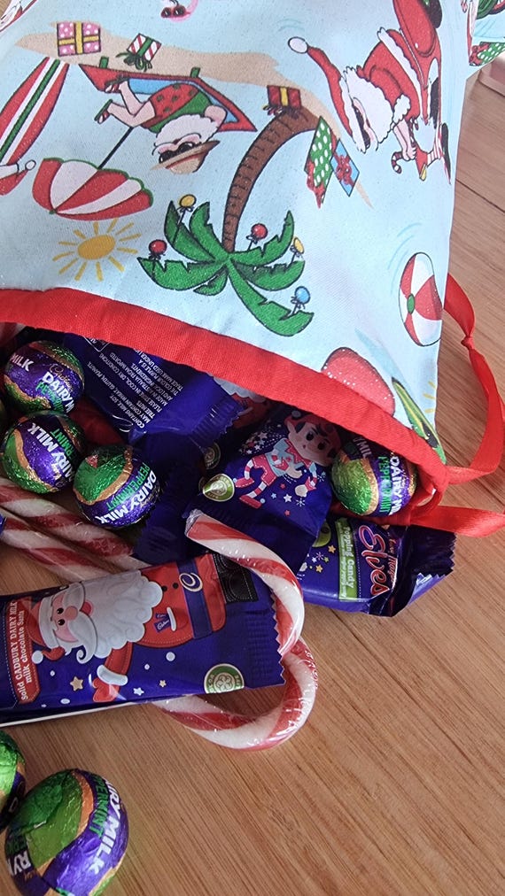 Christmas Surfing Santa Fabric Drawstring Bag | Eco friendly Fabric Bag | Gift Bag | Reusable Bag | Gift Wrap | Wrapping Paper | Fully Lined