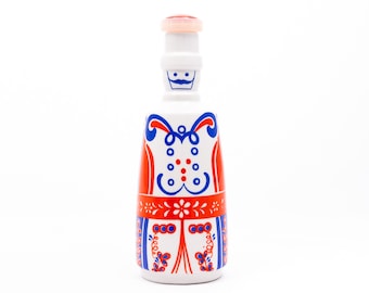 Shepherd in pelt clothes - Porcelain alcohol bottle flask - Grafenthal Germany GDR '70s - Red & blue folky motifs