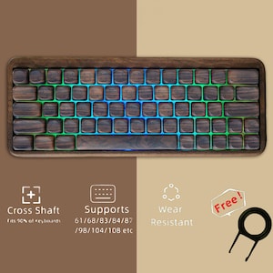 Könnte beinhalten: Eine Holztastatur mit Walnuss-Finish und grün-blauen LED-Leuchten. Die Tastatur hat ein Kreuzwellen-Design und unterstützt 61/68/83/84/87/98/104/108 Tastenlayouts. Sie ist verschleißfest und wird mit einem Tastenkappenzieher geliefert.