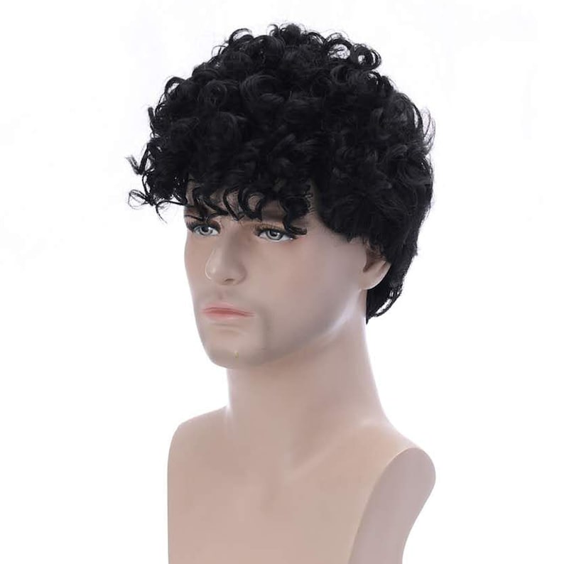 May include: A black curly wig on a mannequin head. The wig is short and has a natural-looking texture.