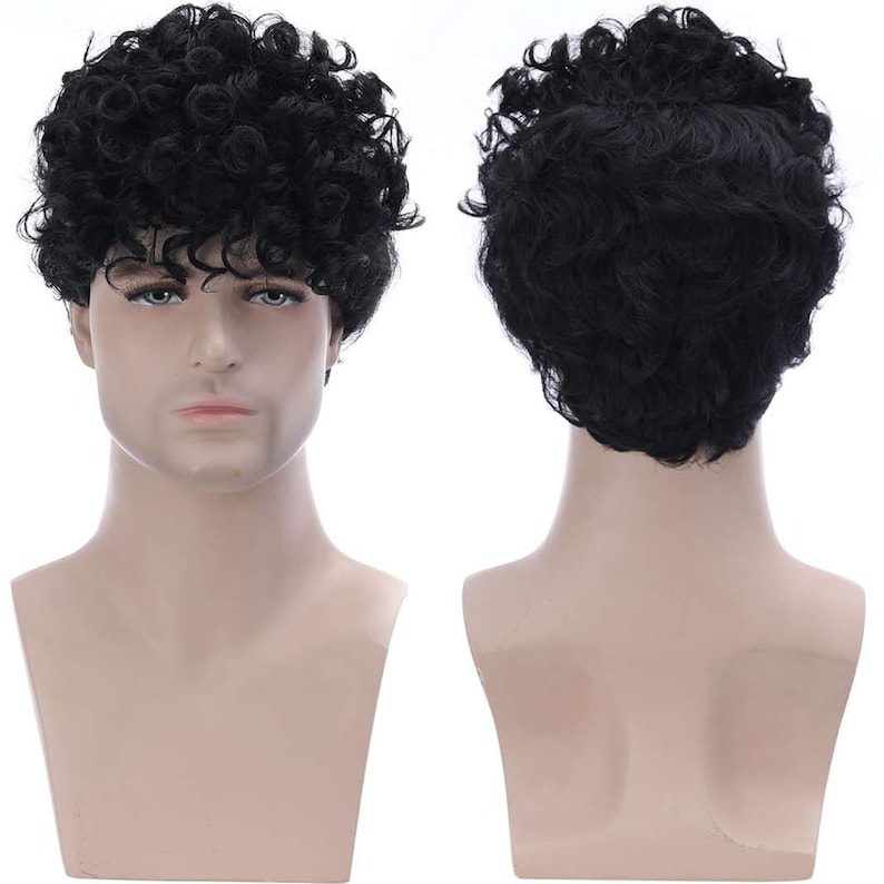 May include: A black curly wig on a mannequin head. The wig is styled in a short, curly afro.