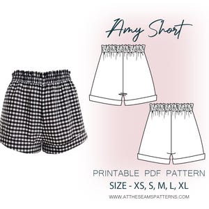 May include: Printable PDF sewing pattern for Amy Shorts. The pattern includes sizes XS, S, M, L, and XL. The image shows a black and white gingham fabric version of the shorts.