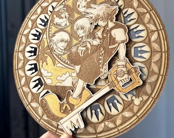 May include: A wooden wall hanging featuring a circular design with a keyhole and a character from a video game holding a key. The design is surrounded by a crown motif.
