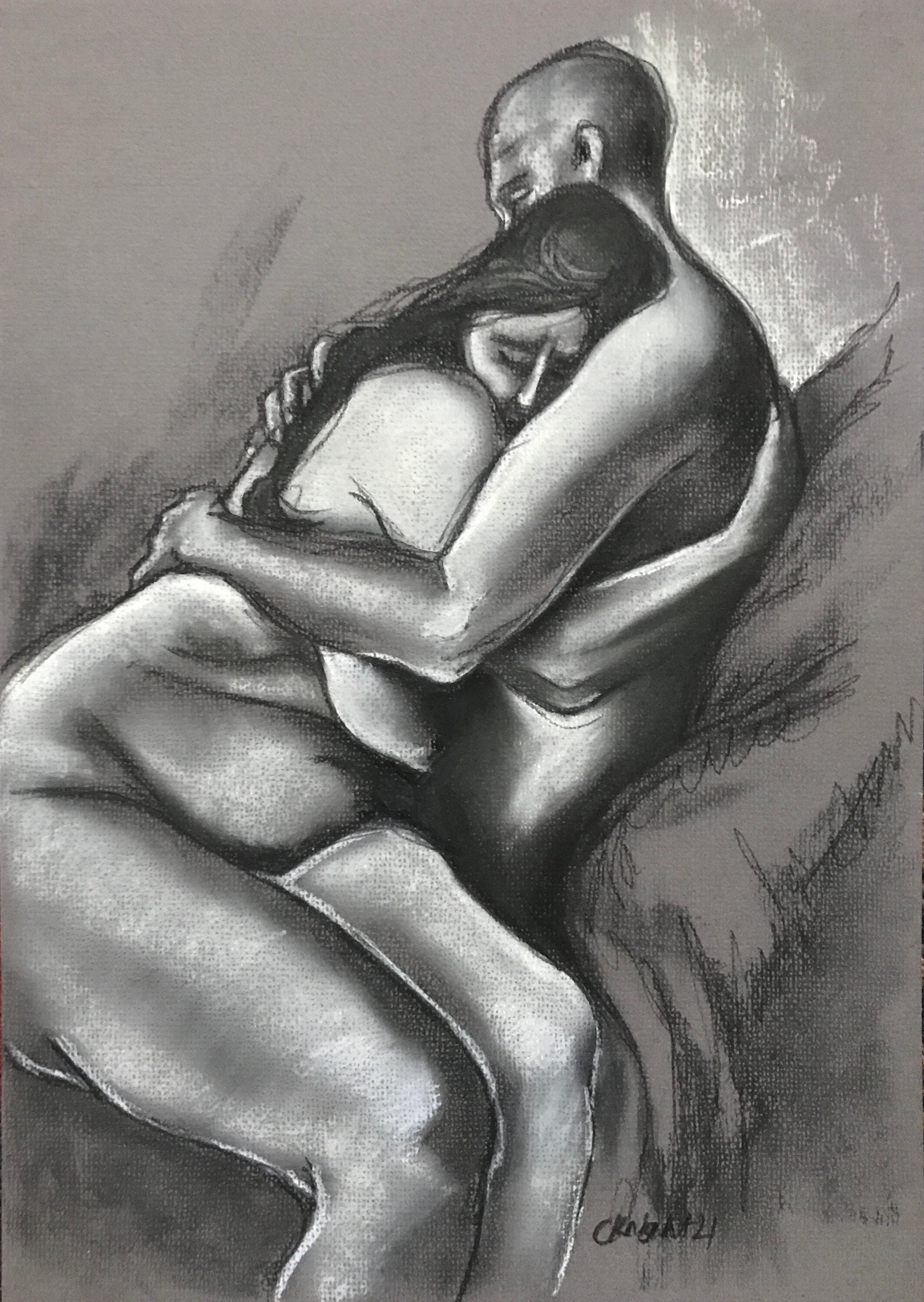 Nude couple cuddle