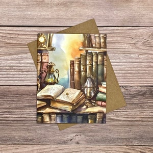 May include: A watercolor painting of a bookshelf filled with old books. There is a lamp, an open book, and a decorative object on a table in front of the bookshelf.