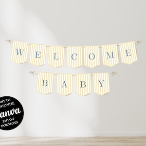 Może przedstawiać: Baner z napisem "WELCOME BABY" w granatowych literach. Baner składa się z kremowych proporczyków z żółtymi pionowymi paskami. Słowa są wyświetlane na dwóch rzędach proporczyków, a baner jest związany sznurkiem.