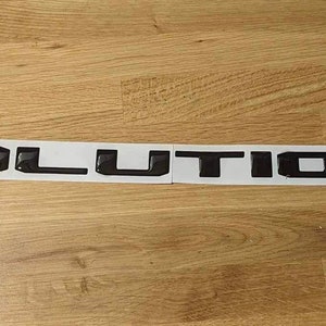 Mitsubishi Lancer Evolution IX Domed Resin Badge