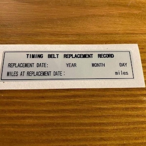 Klistermärke för kamrem