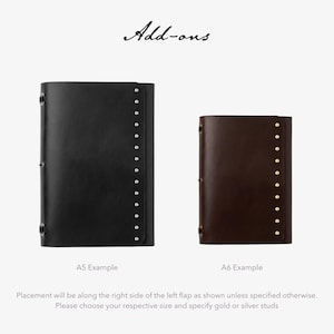 May include: Two leather journal covers, one black and one brown, with metal stud accents. The larger A5 example is on the left, and the smaller A6 example is on the right. The text "Add-ons" is at the top.