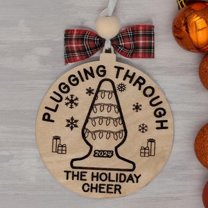 Funny &#39;Plugging Through the Holiday Cheer&#39; 2025 Christmas Ornament