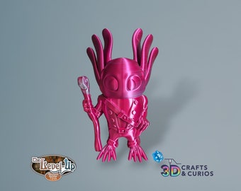 May include: A pink 3D printed figurine of an axolotl holding a stick. The figurine is standing on a gray surface. The text "3D CRAFTS & CURIOS" is visible in the lower right corner of the image.