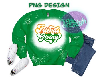 May include: Green sweatshirt with a white splatter paint design. The text "Friends Giving" is in a retro font with orange, yellow, and green colors.