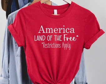 AMERICA |  land of the free, restrictions apply unisex Tshirt.