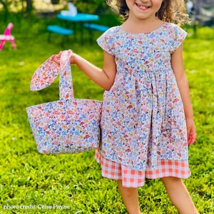 Little girl holding easter basket in matching fabric