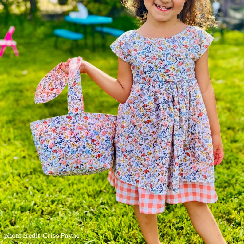Little girl holding easter basket in matching fabric