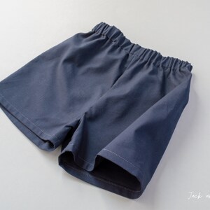 Side view of shorts showing there are no side seams