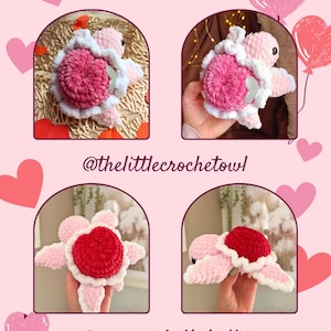 May include: Four crocheted turtle amigurumi toys. Two are pink with a pink heart shell and two are pink with a red heart shell. The turtles are holding a small white flower.