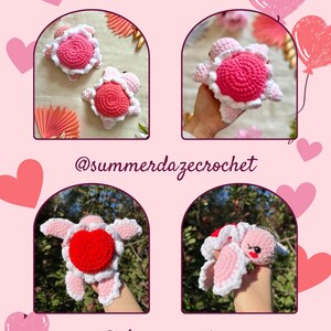 May include: Four crocheted turtle amigurumi toys with pink and red hearts. The turtles are holding hearts in their hands. The image includes the text "@summerdazecrochet" and "@abeegurumies".