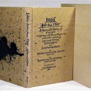 May include: A brown book with the title "1066 And All That" written in black ink. The book is about a memorable history of England, including 103 good things, 5 bad kings, and 2 genuine dates. The book is by Walter Carruthers Sellar and Robert Julian Yeatman, illustrated by John Reynolds.