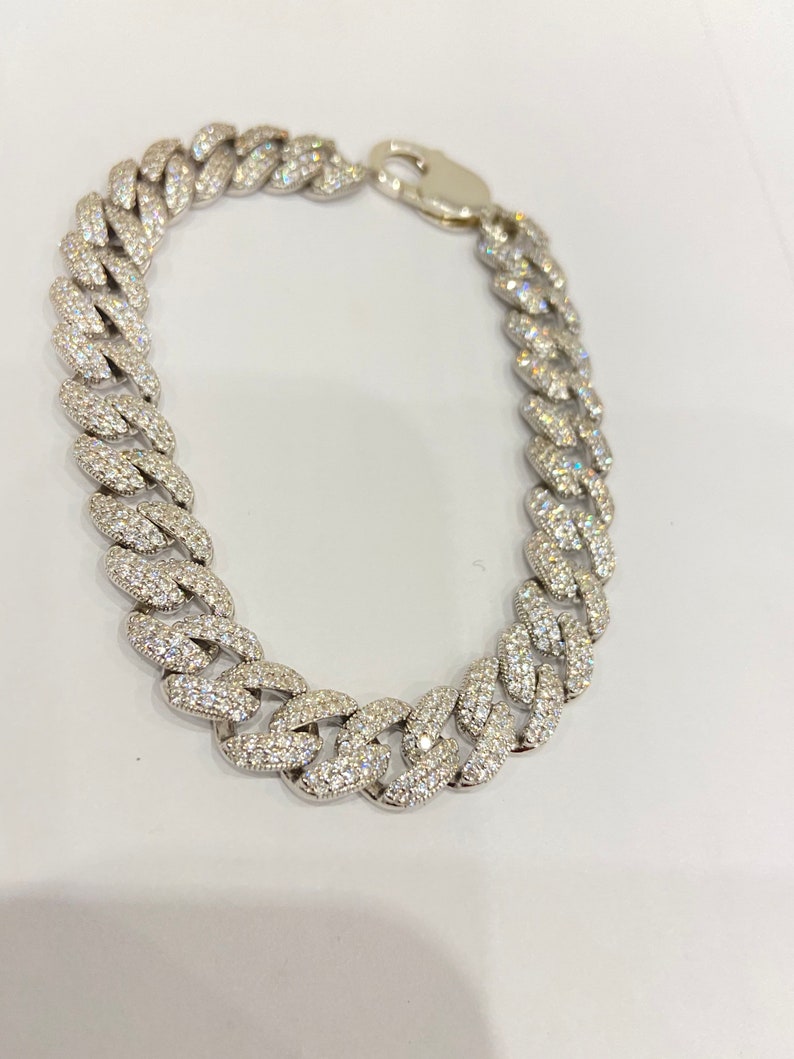 Men\u2019s Silver cz curb bracelet.