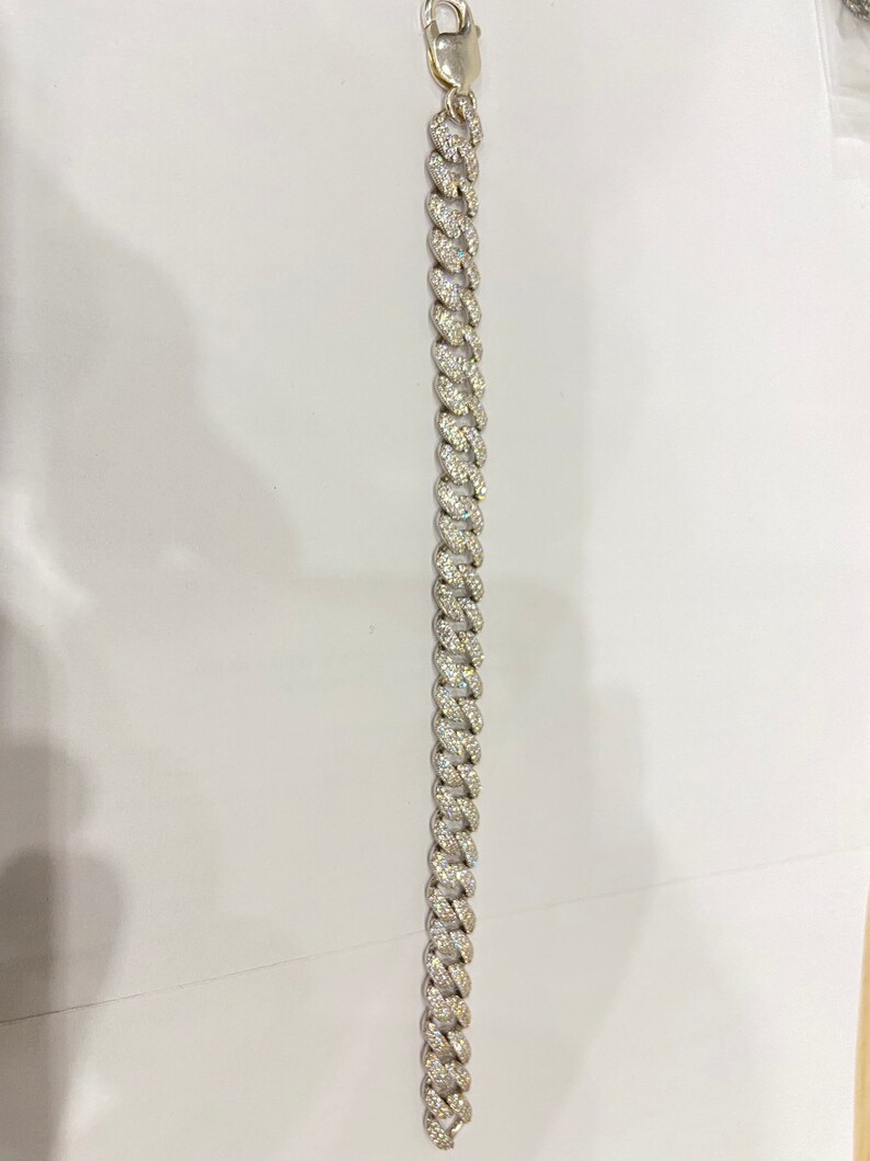 Men\u2019s Silver cz curb bracelet.