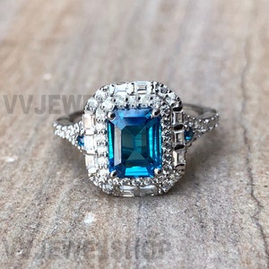 Enchanted Disney Cinderella London Blue Topaz and 3/4 CT. T.W. Diamond Double Frame Engagement Ring, Aquamarine Emerald Cut Ring, 6308