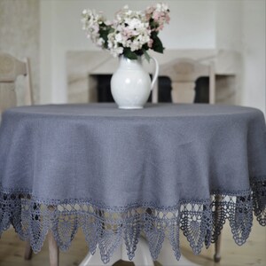 Dark grey linen round tablecloth with crocheted lace hand-woven on ancient wooden looms. Size - round. Color - dark gray.