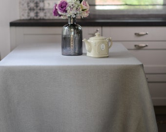 Luxury linen tablecloth hand-woven on ancient wooden looms. Sizes - rectangle, square. Color- light bluish grey.