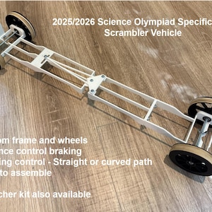 May include: A white Scrambler Vehicle for the 2025/2026 Science Olympiad. It features a custom frame, wheels, distance control braking, and steering control for straight or curved paths. Easy to assemble. Launcher kit also available.