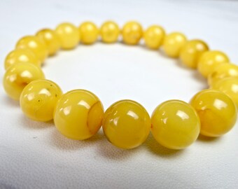 AMBER PENDANT Polished Yellow Egg Yolk Opaque Bead on Black Cord Unisex Jewelry 4g 11666