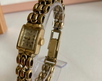 Golden wristwatch by Dugena for women | gold | small | filigree | vintage | mechanical ladies watch | retro
