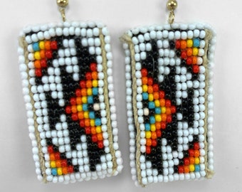 White beaded earrings with design