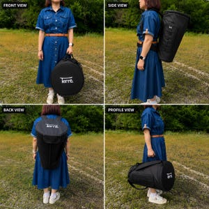 May include: A black Terre brand duffel bag and backpack set. The duffel bag is cylindrical with a handle, and the backpack is designed to carry a large, round object. Both bags have the Terre logo in white.