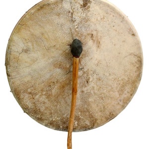 May include: A brown leather drum with a wooden stick and a black head. The drum is round and has a diameter of about 20 inches.